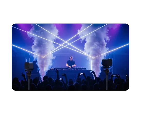 Over 76% of 'Live Music Broadcasters' struggle to stream high-quality, immersive DJ sets to online audiences while capturing dynamic light shows in low-light environments.