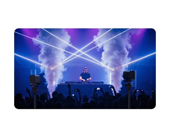 Over 76% of 'Live Music Broadcasters' struggle to stream high-quality, immersive DJ sets to online audiences while capturing dynamic light shows in low-light environments.