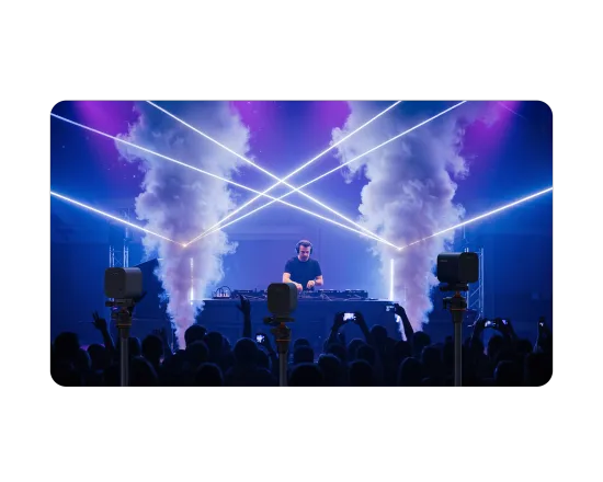 Over 76% of 'Live Music Broadcasters' struggle to stream high-quality, immersive DJ sets to online audiences while capturing dynamic light shows in low-light environments.