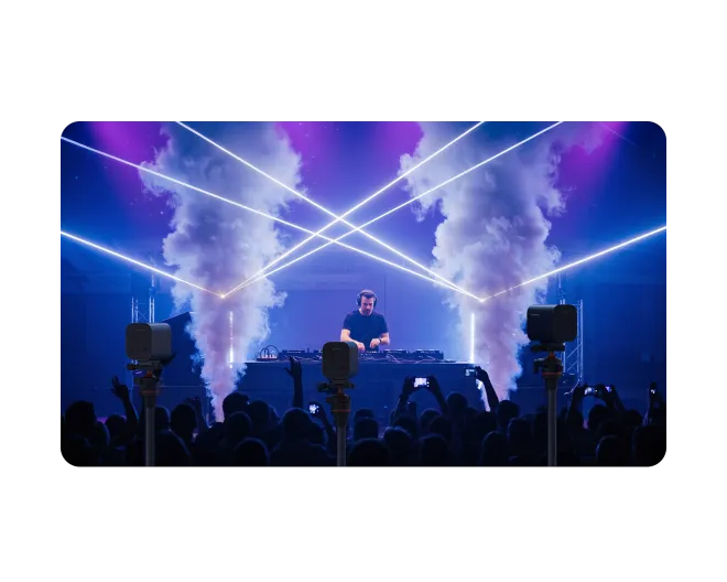 Over 76% of 'Live Music Broadcasters' struggle to stream high-quality, immersive DJ sets to online audiences while capturing dynamic light shows in low-light environments.